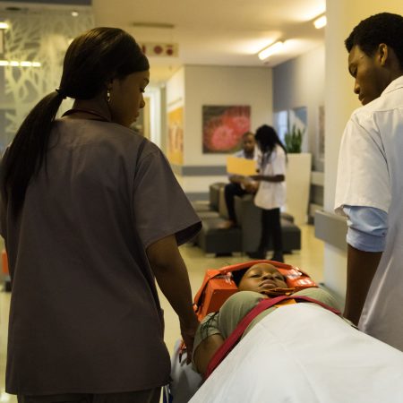 Bringing in a patient with a spine and back injury